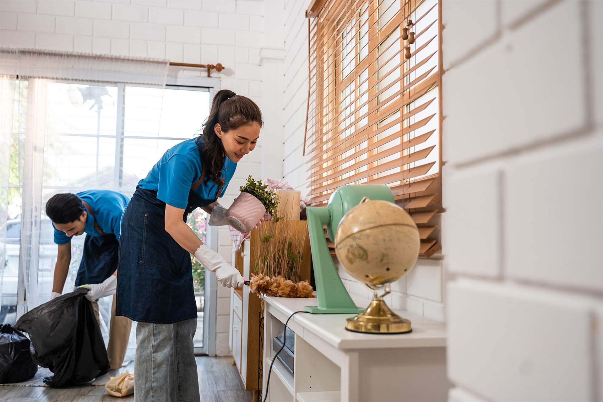 asian-young-man-and-woman-cleaning-service-worker-2023-11-27-05-00-57-A8VVFUZ.jpg
